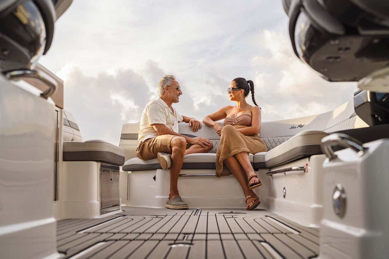 Couple aboard an SLX 360 Outboard