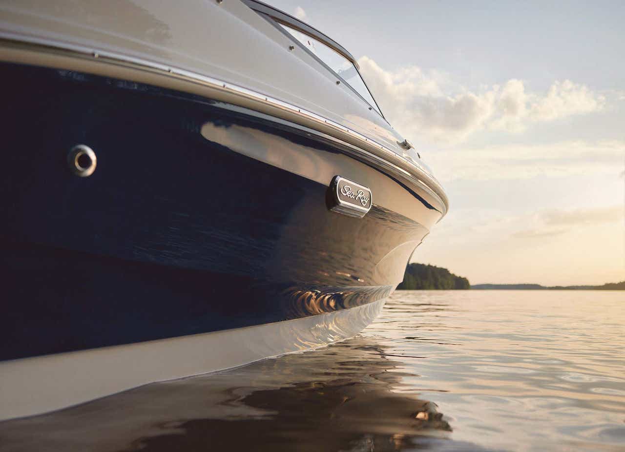 SPX 190 Outboard hull and badge detail at sunset