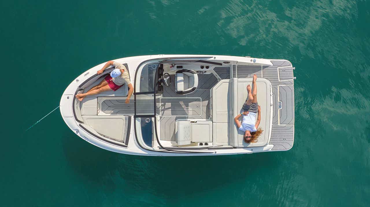 Aerial view of a couple lounging aboard an SPX 190