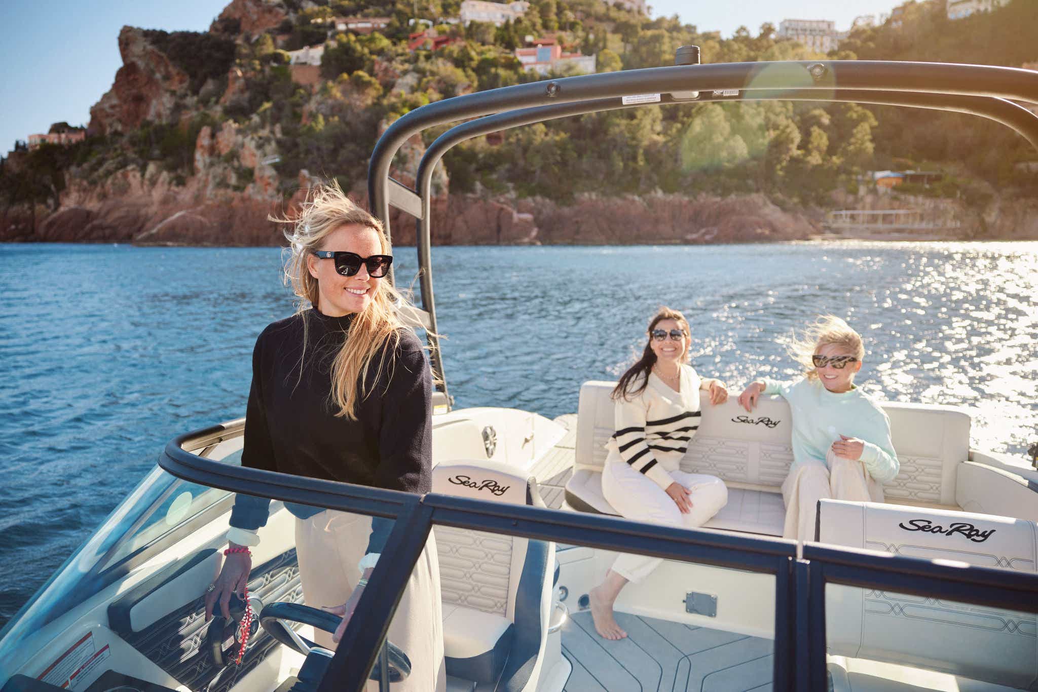 Woman at the helm of an SPX 210