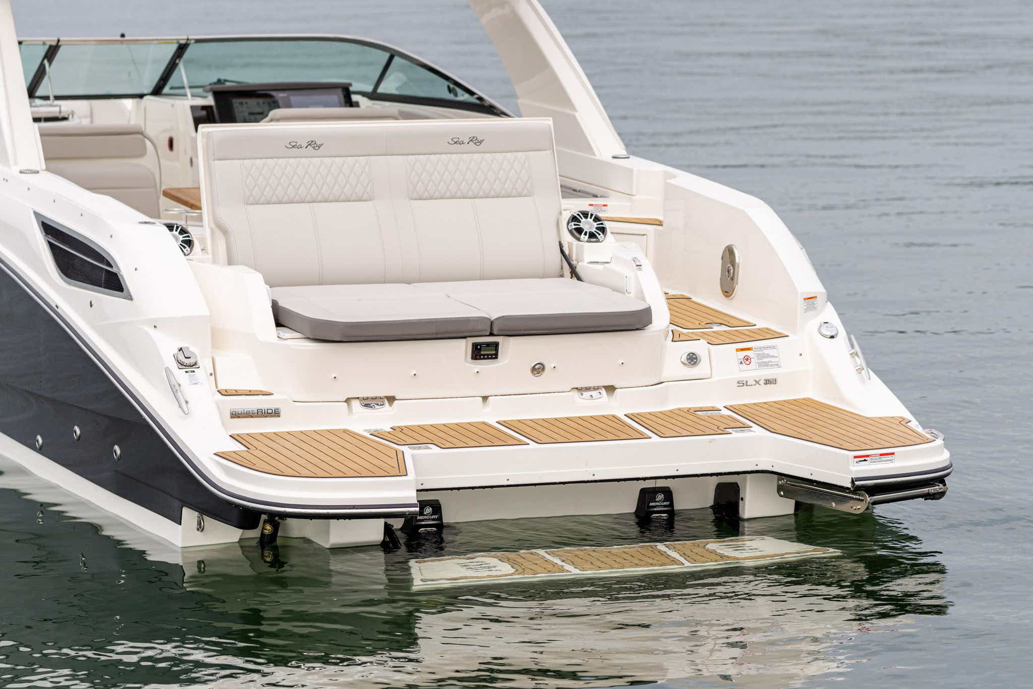 2024 SLX 350 port stern swim platform step transom loungers