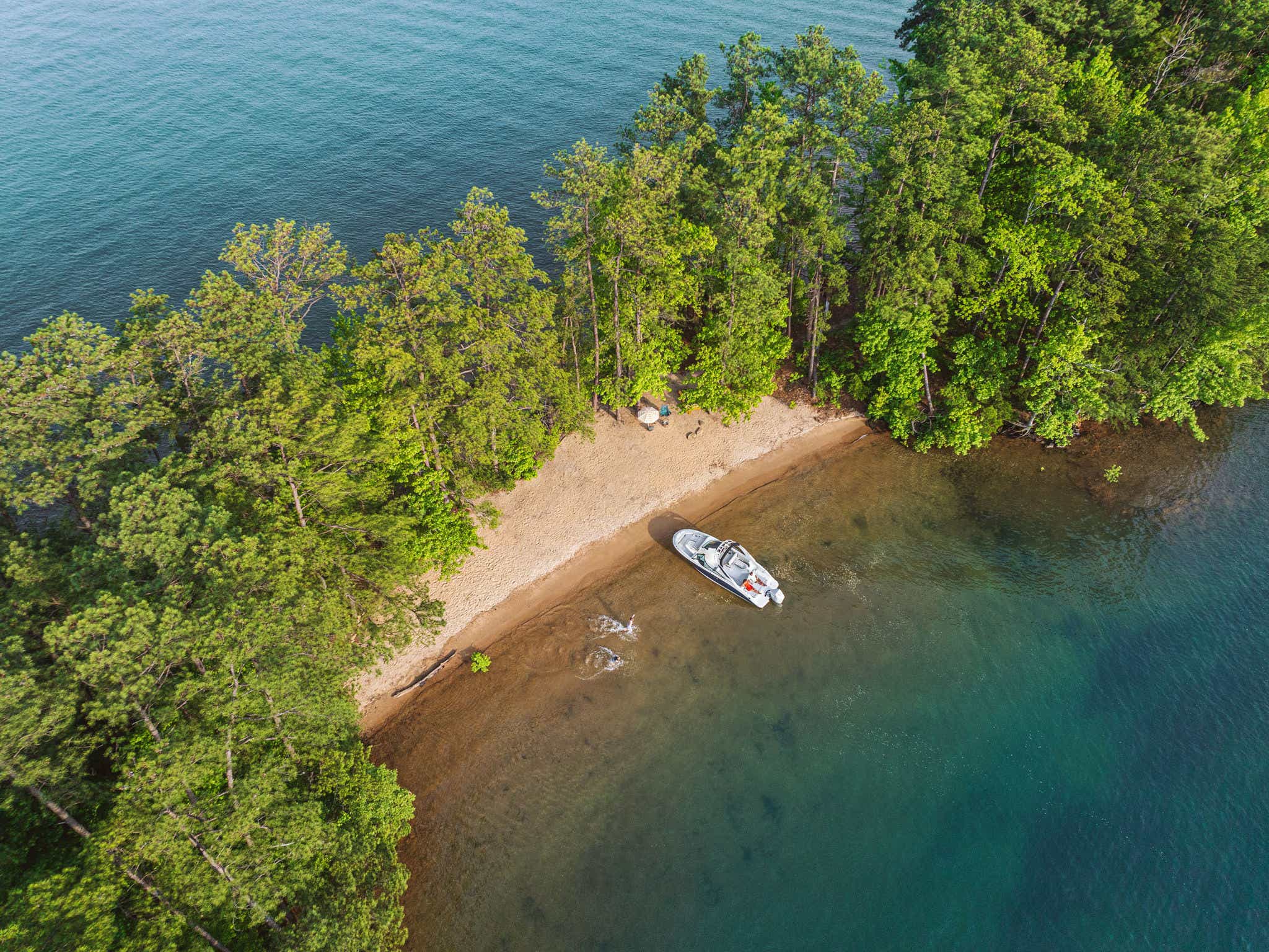 Aerial view of an SDX 250 Outboard at a secluded beach
