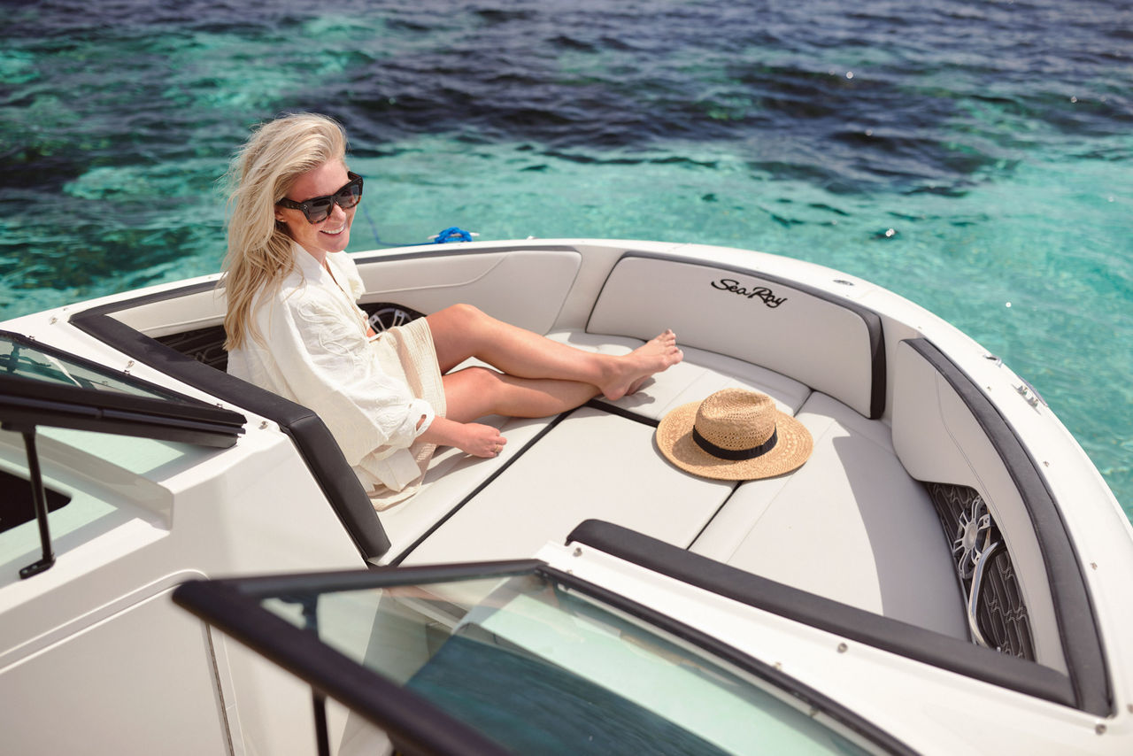 Woman lounging aboard an SPX 210