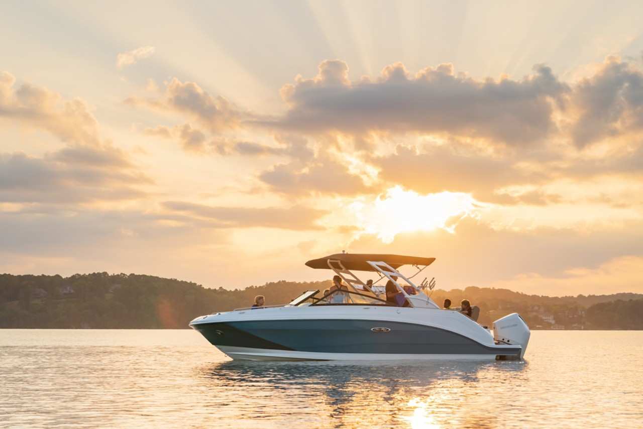 SDX 250 Outboard port family wakeboarding sunset