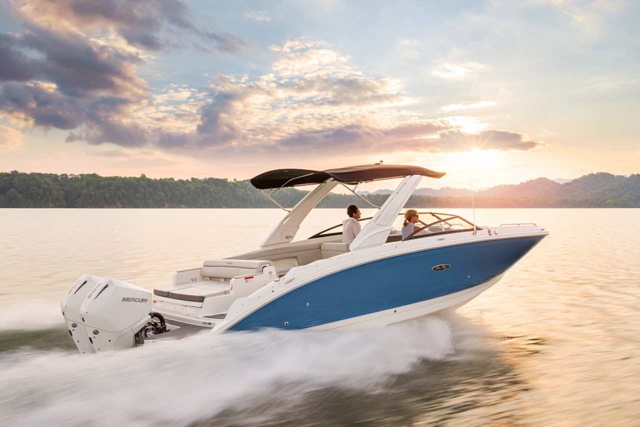 SDX 290 Outboard running starboard stern three quarter sunset
