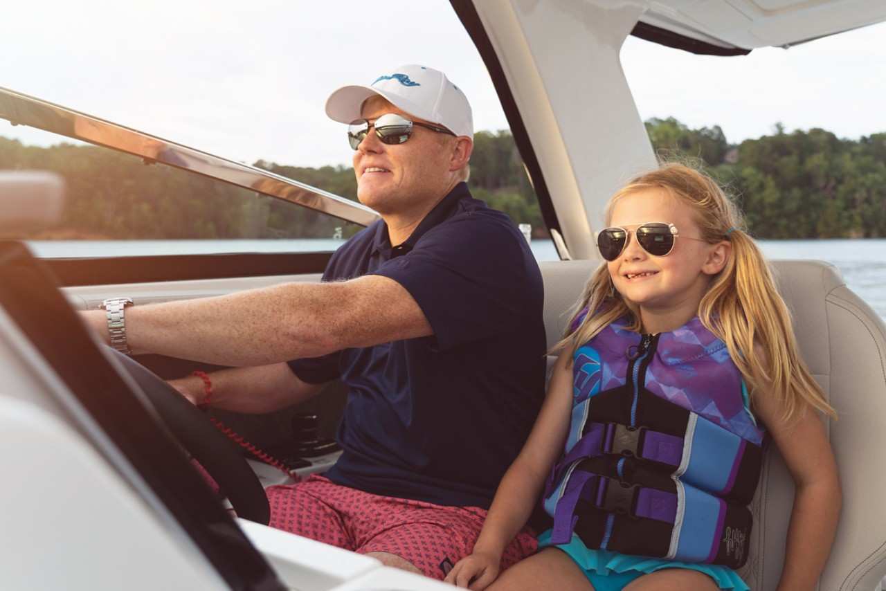 SLX 350 family life jacket father daughter helm