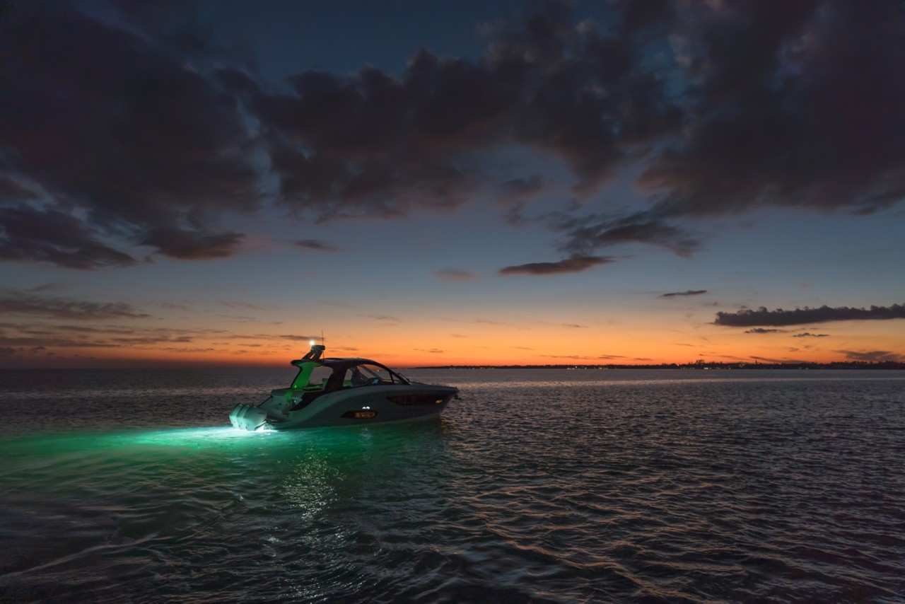 Sundancer 370 Outboard starboard stern underwater accent lighting twilight
