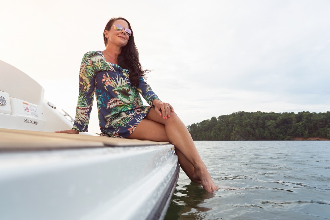 Woman at swim platform of 2024 SLX 350