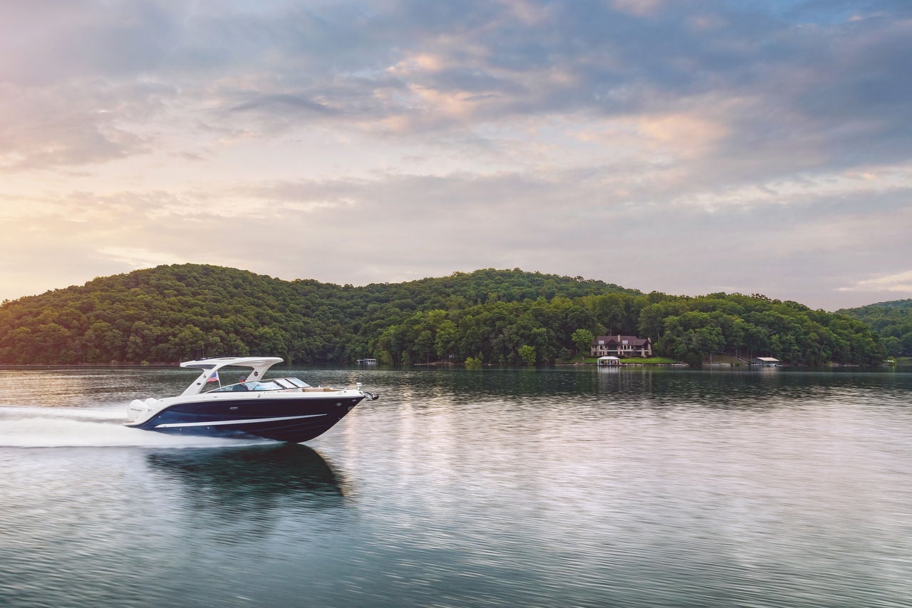 Sea Ray SLX 310 Outboard boat running starboard bow